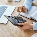 man calculating the average cost of divorce in Georgia